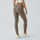 Leggings de treino com controle de barriga de cintura alta e bolsos laterais